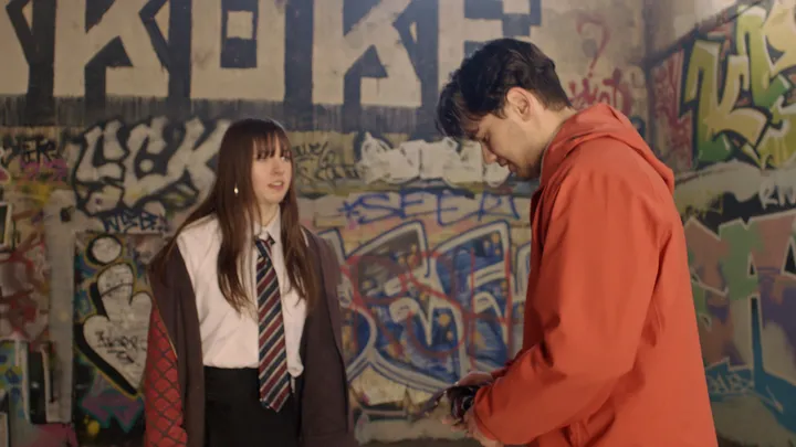 Still from Skive — graffiti wall