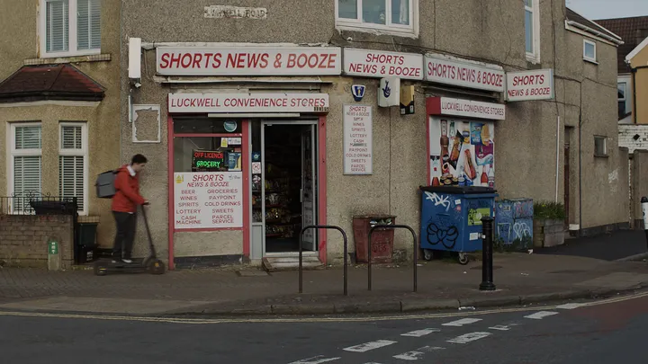 Still from Skive — corner shop