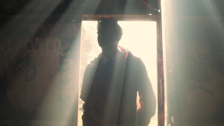Still from Skive — doorway silhouette